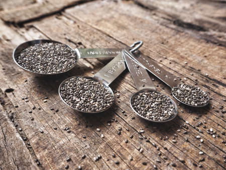 Chia seeds with spoonsの写真素材