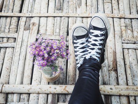 Selfie of sneakers with flwersの写真素材