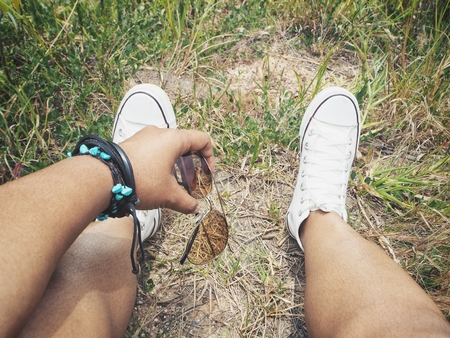 Selfie of sneakers with sun glassesの写真素材