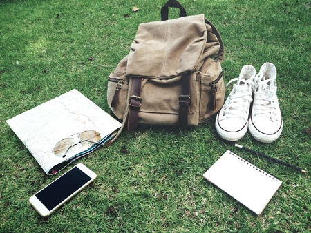 Travel accessories of bag with shoes and smart phone with sunglassesの写真素材