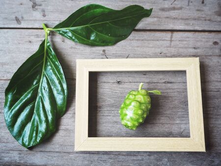 Noni fruit with picture frameの写真素材