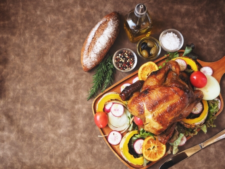 Roasted turkey in thanksgiving on brown backgroundの写真素材