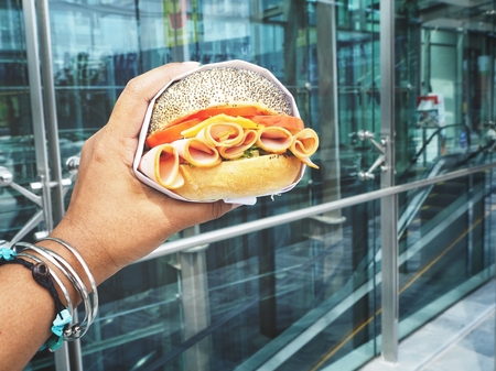 Selfie of hamburger on handの写真素材