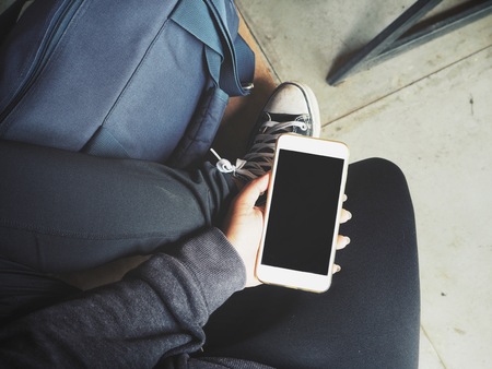 Woman using smart phone on handの写真素材