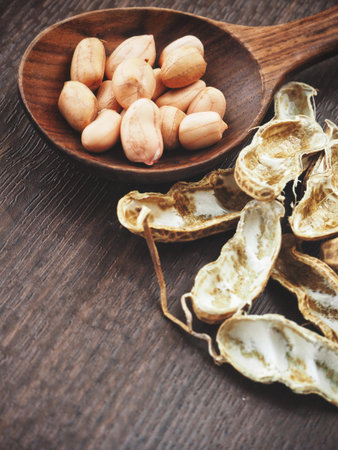Peanuts on wood background