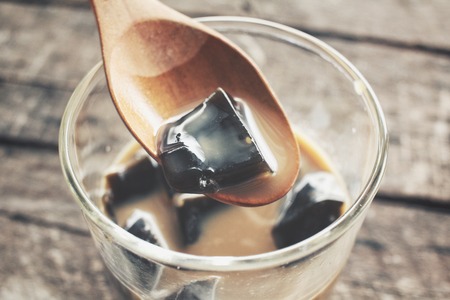 Coffee jelly on wood backgroundの写真素材