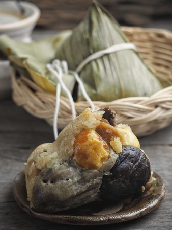 Zongzwith hot tea Chinese foodの写真素材