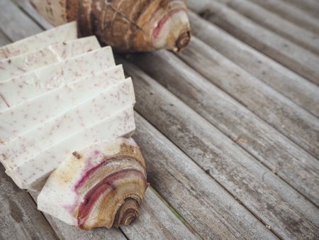 Taro on wood backgroundの写真素材