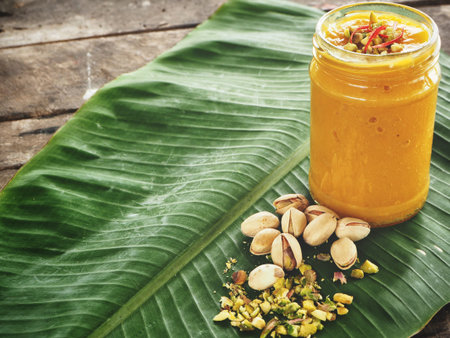 Mango lassi on banana leaves Indian drink
