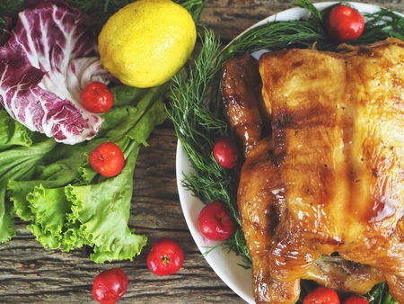 Roasted turkey and vegetables for thanksgiving dayの写真素材