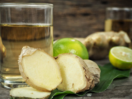 Ginger drink on wood background