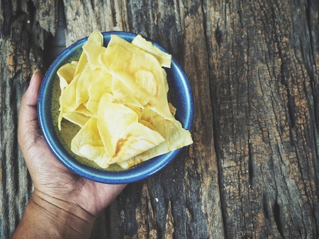 Fried durian snack on handの写真素材