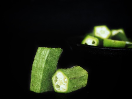 Okra on black backgroundの写真素材