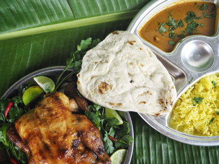 Tandoori chicken bbq and naan bread with rice Indian food