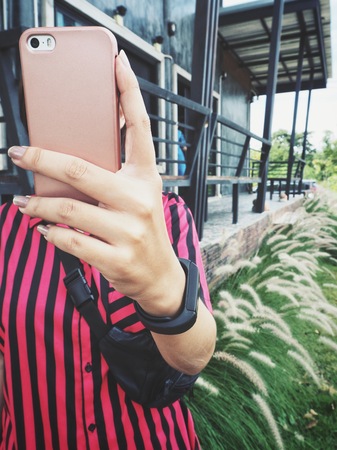 Woman using smart phone on handの写真素材