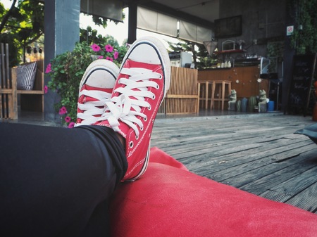 Selfie of red sneakersの写真素材