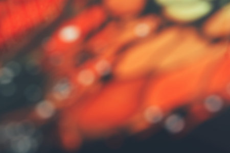 Blurred of orange and black background or texture