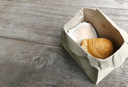 Curry puff on wood backgroundの写真素材