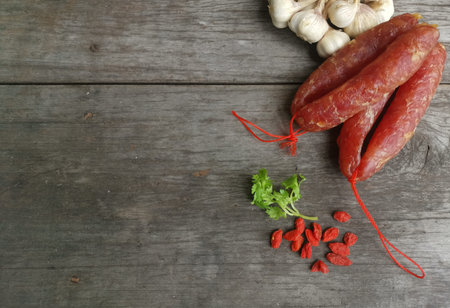 Chinese sausage pork on wood backgroundの写真素材