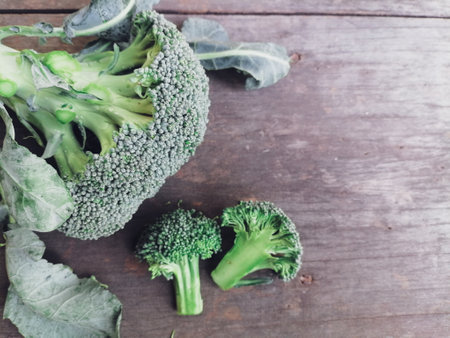 Green broccoli healthy food on table wood backgroundの写真素材