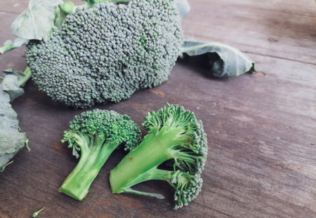 Green broccoli healthy food on table wood background