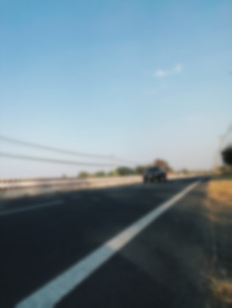 Blurred of car on the roadの写真素材