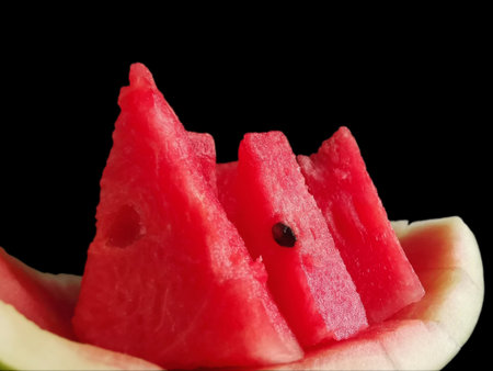 Watermelon summer fruit on black background