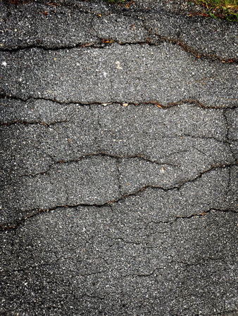 Cluse up of crack street road background or texture