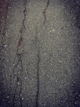 Cluse up of crack street road background or textureの写真素材