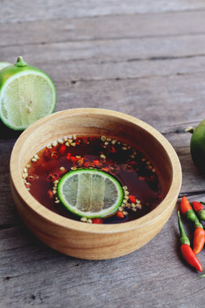 Fish sauce with red chili and limeの写真素材