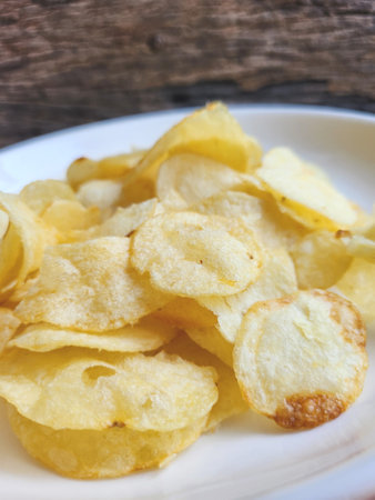 Potato chips on the plateの写真素材