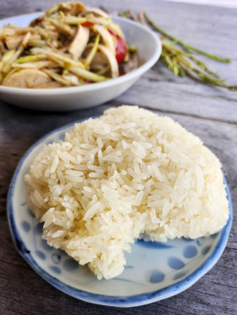 Papaya salad spicy and sticky rice Thai foodの写真素材