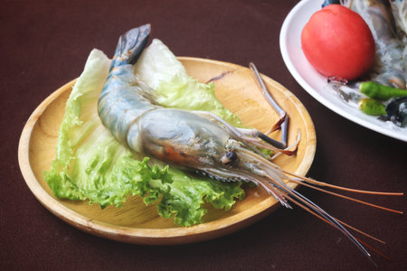 Raw fresh shrimp on a plateの写真素材