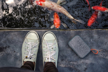 Selfie of bluetooth speaker and sneakersの写真素材