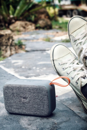 Selfie of bluetooth speaker and sneakersの写真素材