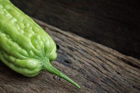 Chinese bitter melon on wood backgroundの写真素材