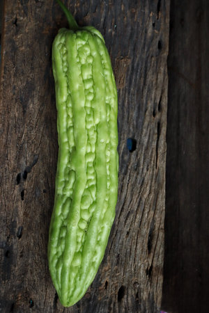 Chinese bitter melon on wood backgroundの写真素材