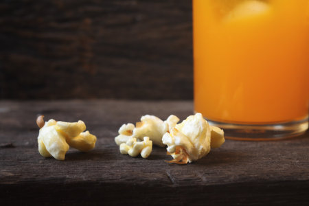 Pop corn and orange soft drinkの写真素材