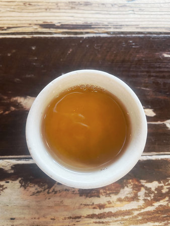 Tea cup on wood background