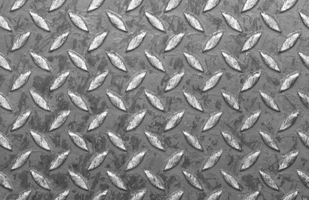Background of metal diamond plate in red color.