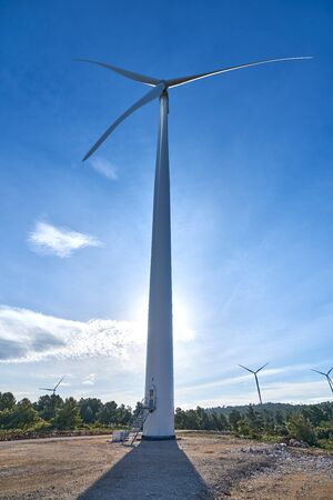 Close-up ecological windmills to generate electricity in a natural environmentの写真素材
