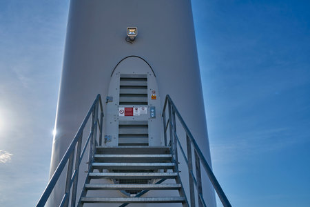 Entrance to an ecological windmills to generate electricity in a natural environmentの写真素材