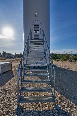 Entrance to an ecological windmills to generate electricity in a natural environmentの写真素材