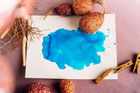 Mock up, splash of color turquoise, watercolor Easter egg, orange, red, gold, easter egg, easter, splash of colorの写真素材