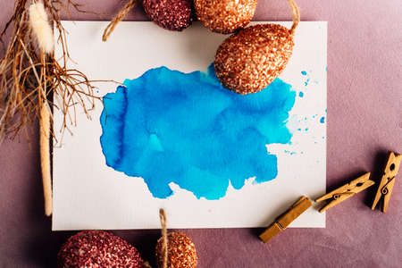 Mock up, splash of color turquoise, watercolor Easter egg, orange, red, gold, easter egg, easter, splash of colorの写真素材
