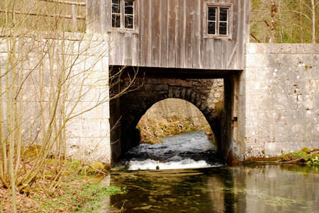 Armed by a riverの写真素材