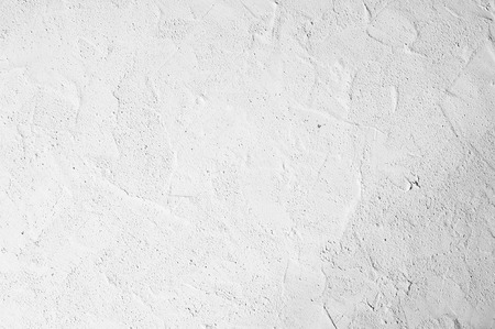 Decorative white plaster texture, seamless background. Grungy concrete wall, high detailed fragment stone wall.の写真素材