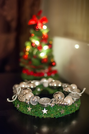 Red christmas wreath with decorations. Holiday interior.の写真素材