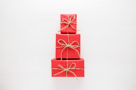 Christmas tree made of colorful presents and gifts. Flat lay. Holiday concept.の写真素材