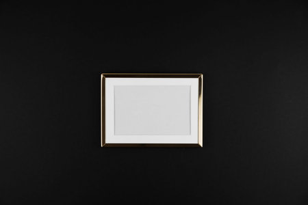 Autumn composition. Golden Frame on black background. Flat lay, top view, copy space. Sale and Black...